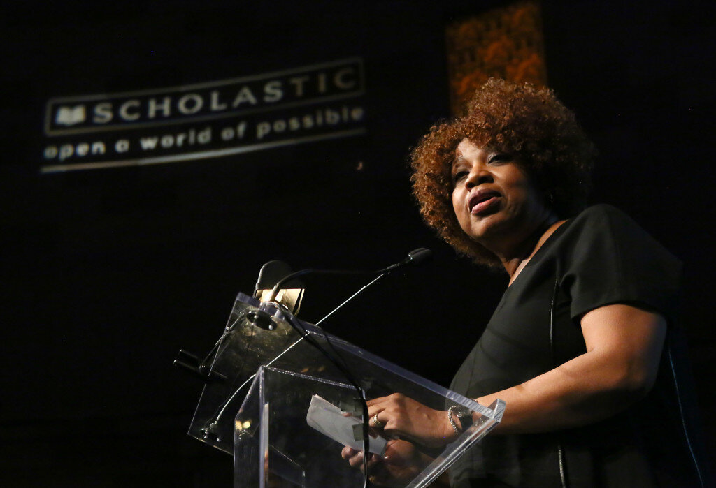 Director of the Institute of Politics at John F. Kennedy School of Government at Harvard University, Margaret A. Williams honors Chairman and CEO of Scholastic, Richard Robinson, during Goddard Riverside Community Center's Annual Book Fair Gala at Gotham Hall, New York, N.Y., Tuesday, October 27, 2015. (Stuart Ramson/AP Images for Scholastic)